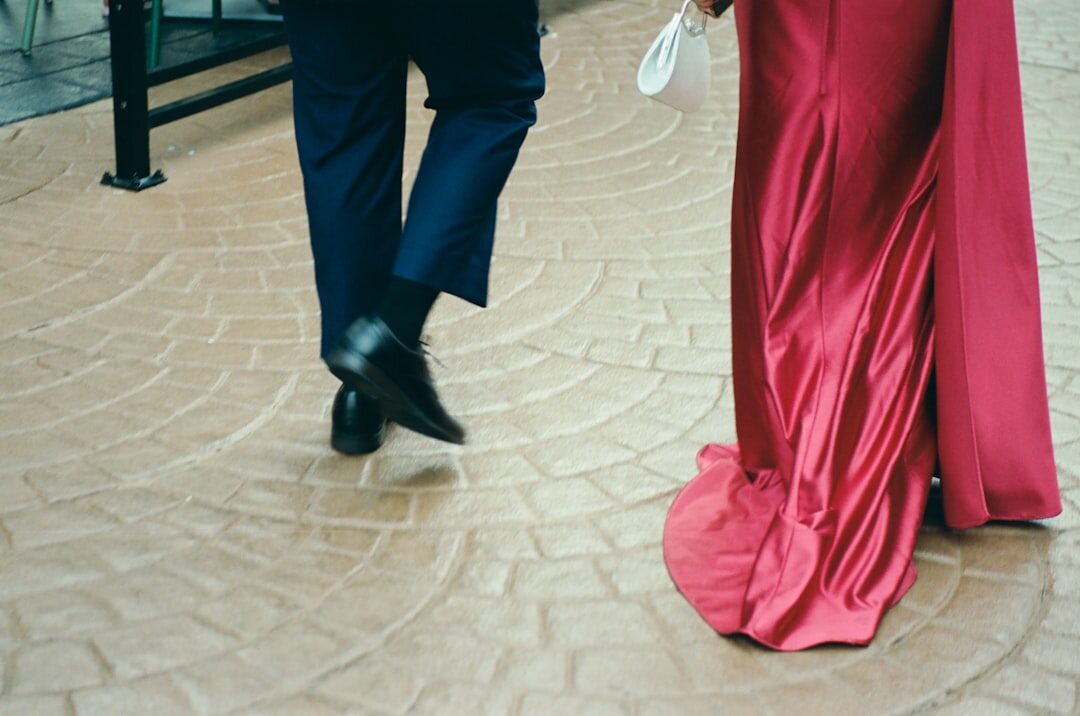 celebrity couple embracing on red carpet